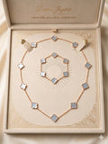 SET De Trebol  2 piezas Oro 10K  Azul Tornasol. size #20 con extension  a # 22 P. Manilla # 7 con extension  a # 8
