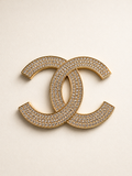 Broche CC Oro 14K  en piedras de zirconia