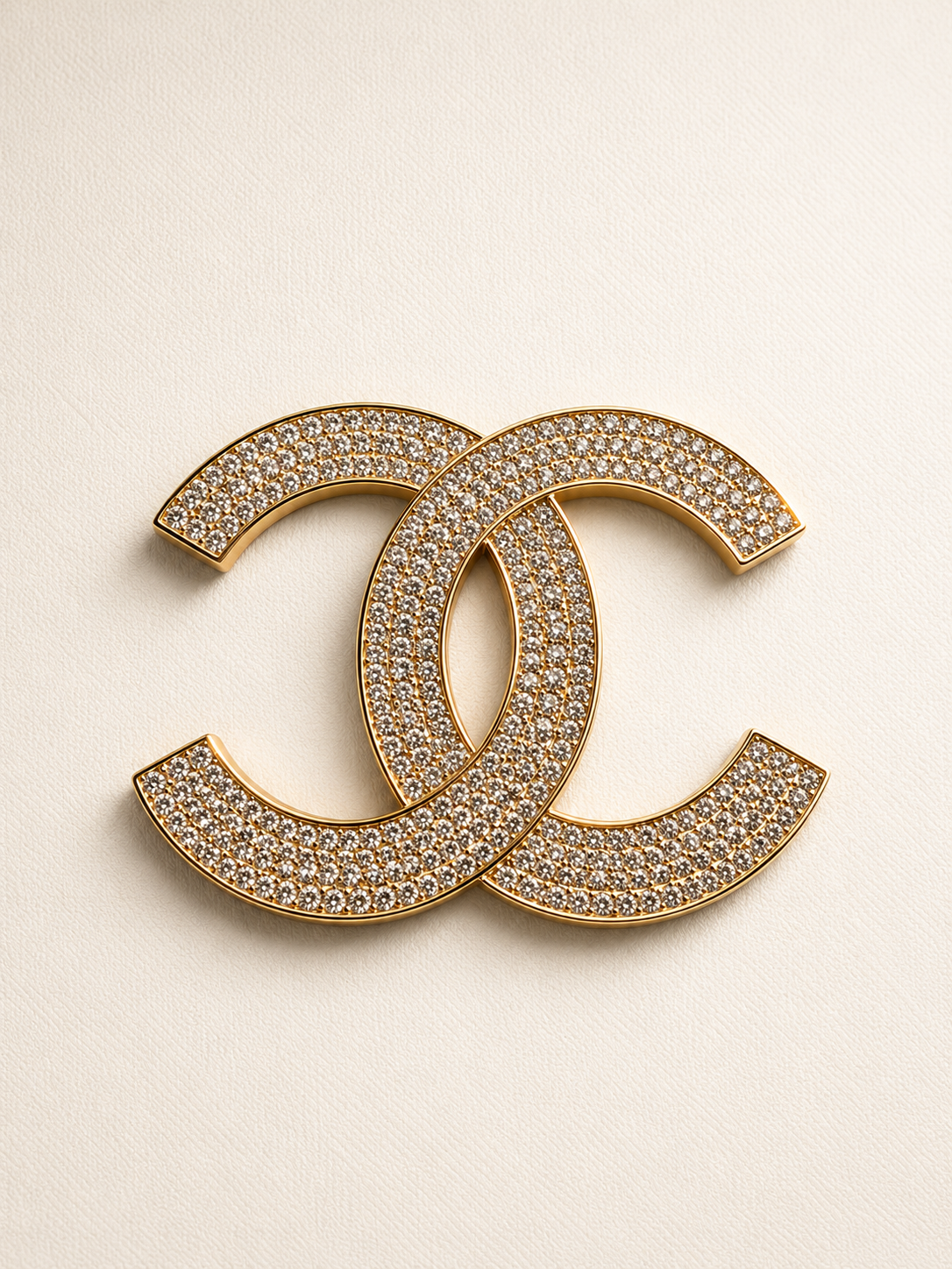 Broche CC Oro 14K  en piedras de zirconia